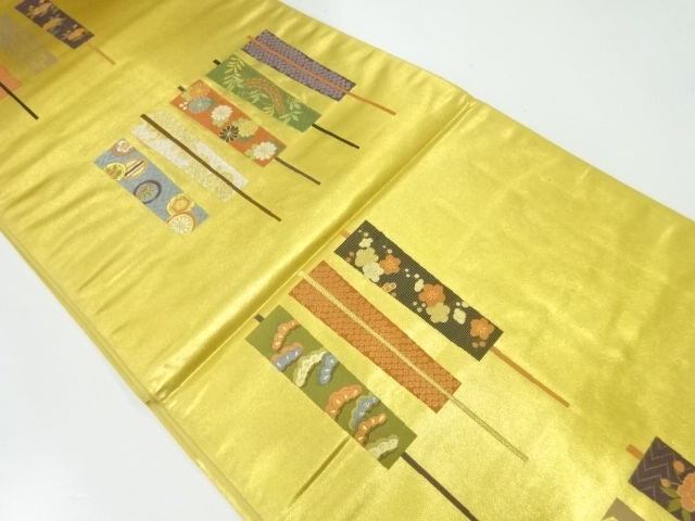 扇に草花模様織出し袋帯